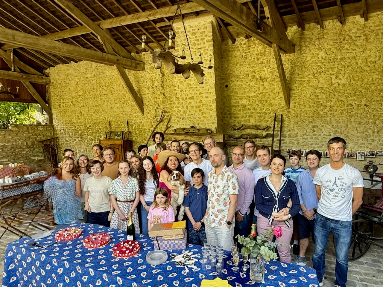 Family gathered for a meal at Moulin à Rêves
