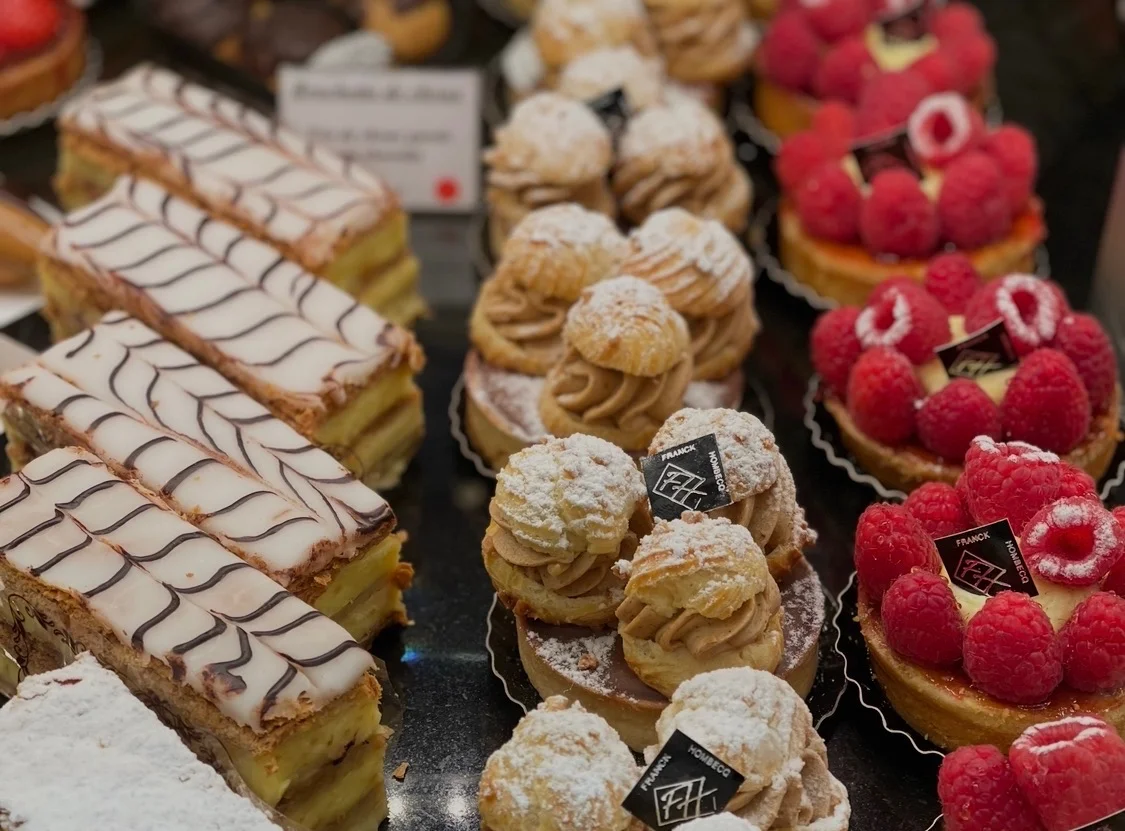 Fresh pastries — mille-feuille, choux à la crème, and raspberry tarts — at the village boulangerie in Méréville