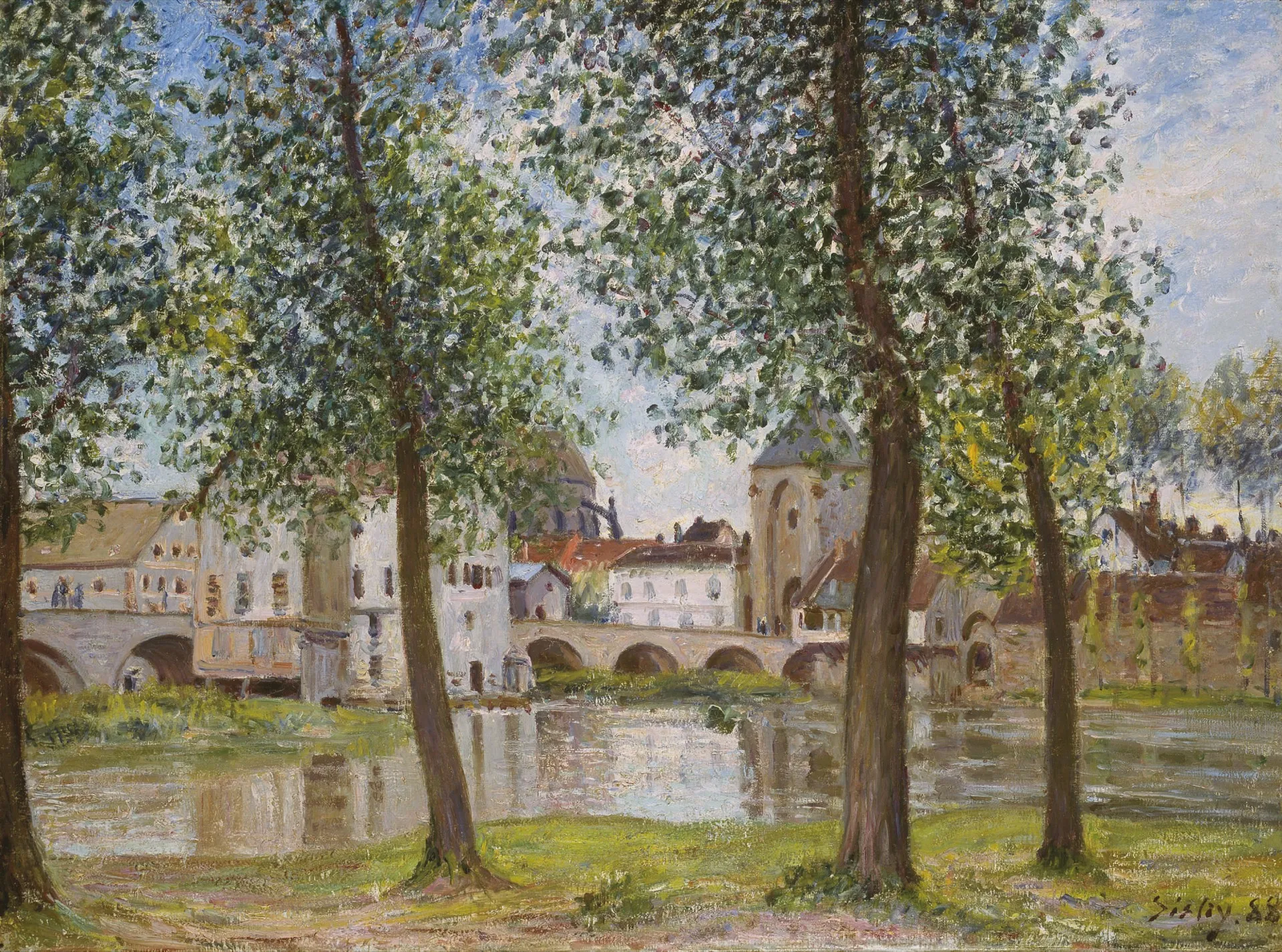 Stone bridge over the Loing river in Moret-sur-Loing, twenty-five minutes from Moulin à Rêves
