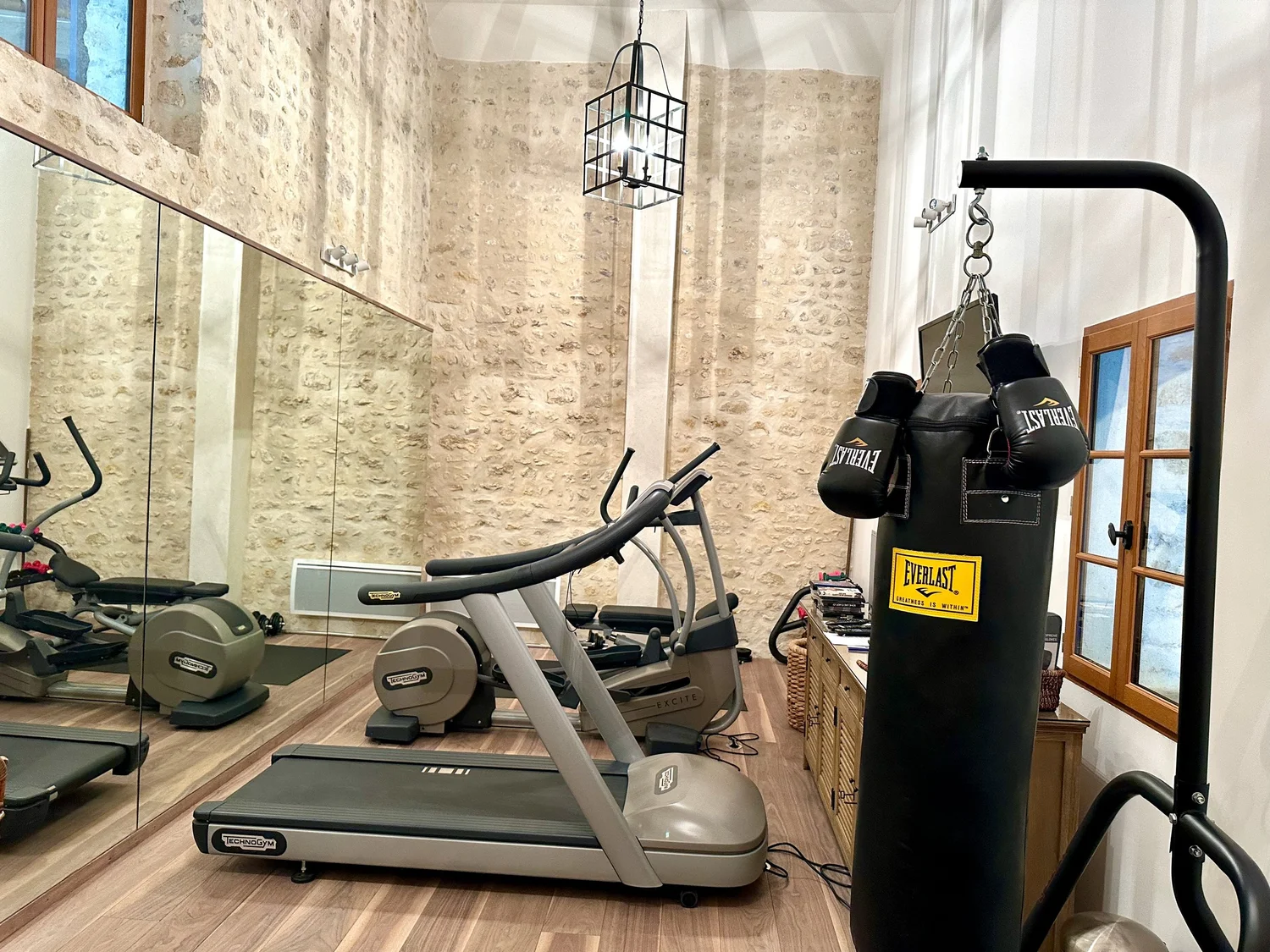 The petanque court under linden trees at Moulin à Rêves compound