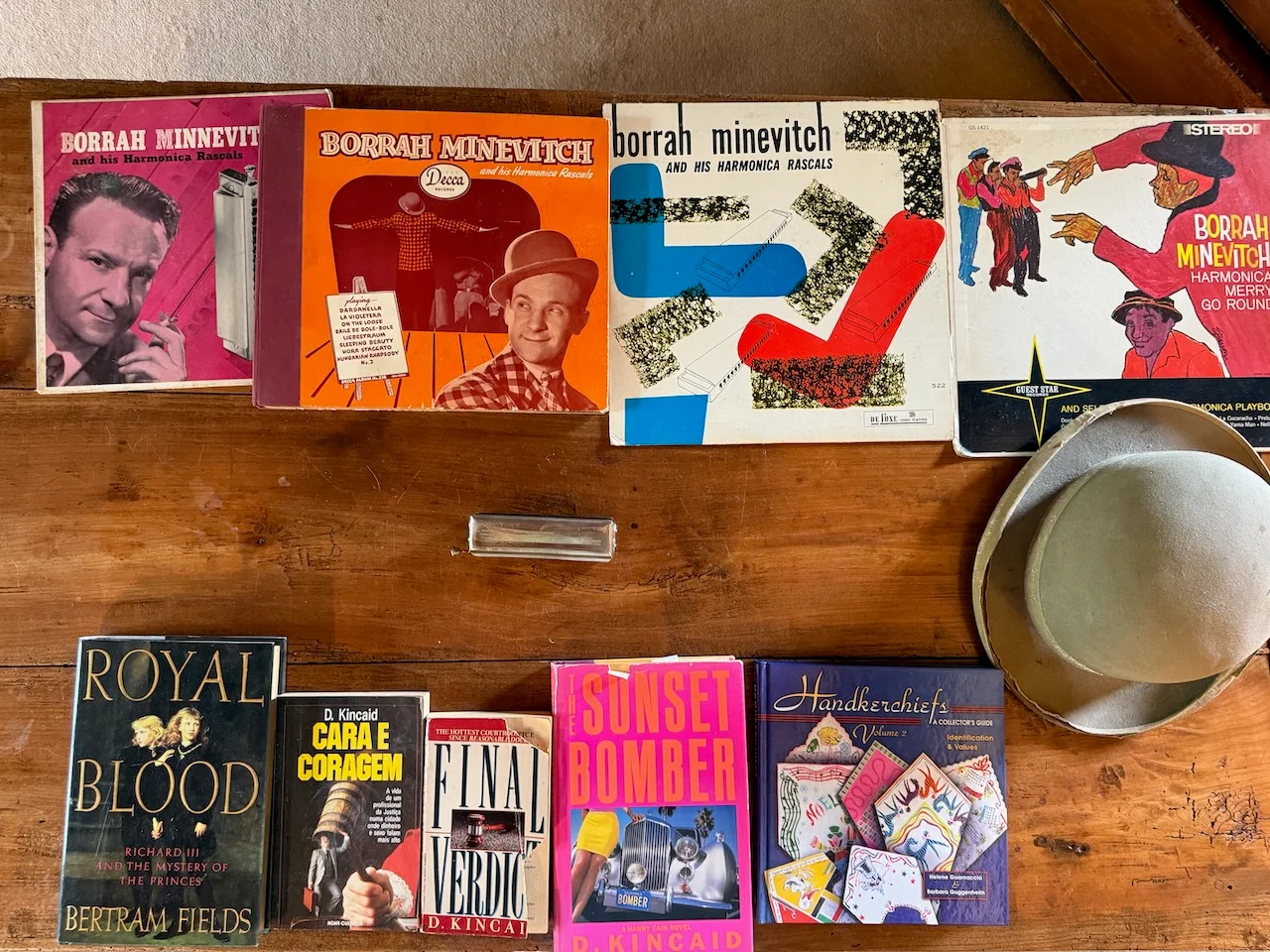 Borrah Minevitch's record albums and books, alongside Bert and Barbara memorabilia