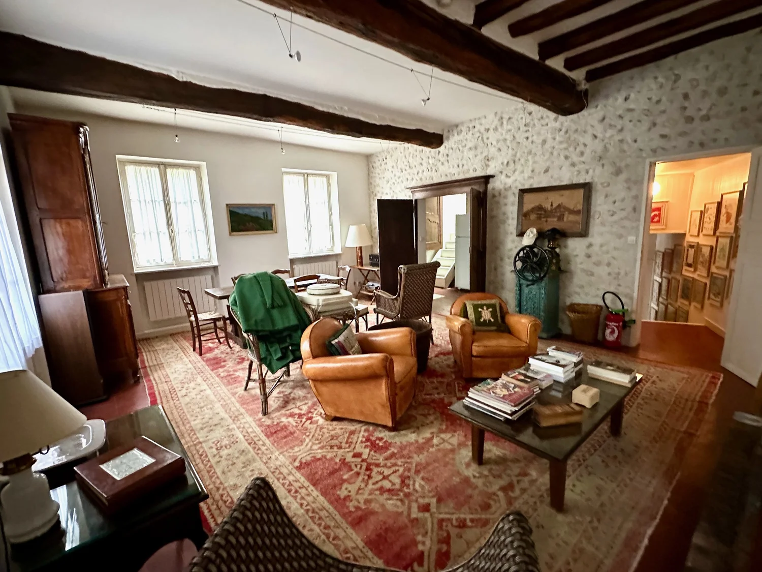 La Grange soaring five-metre ceiling with original beams at Moulin à Rêves