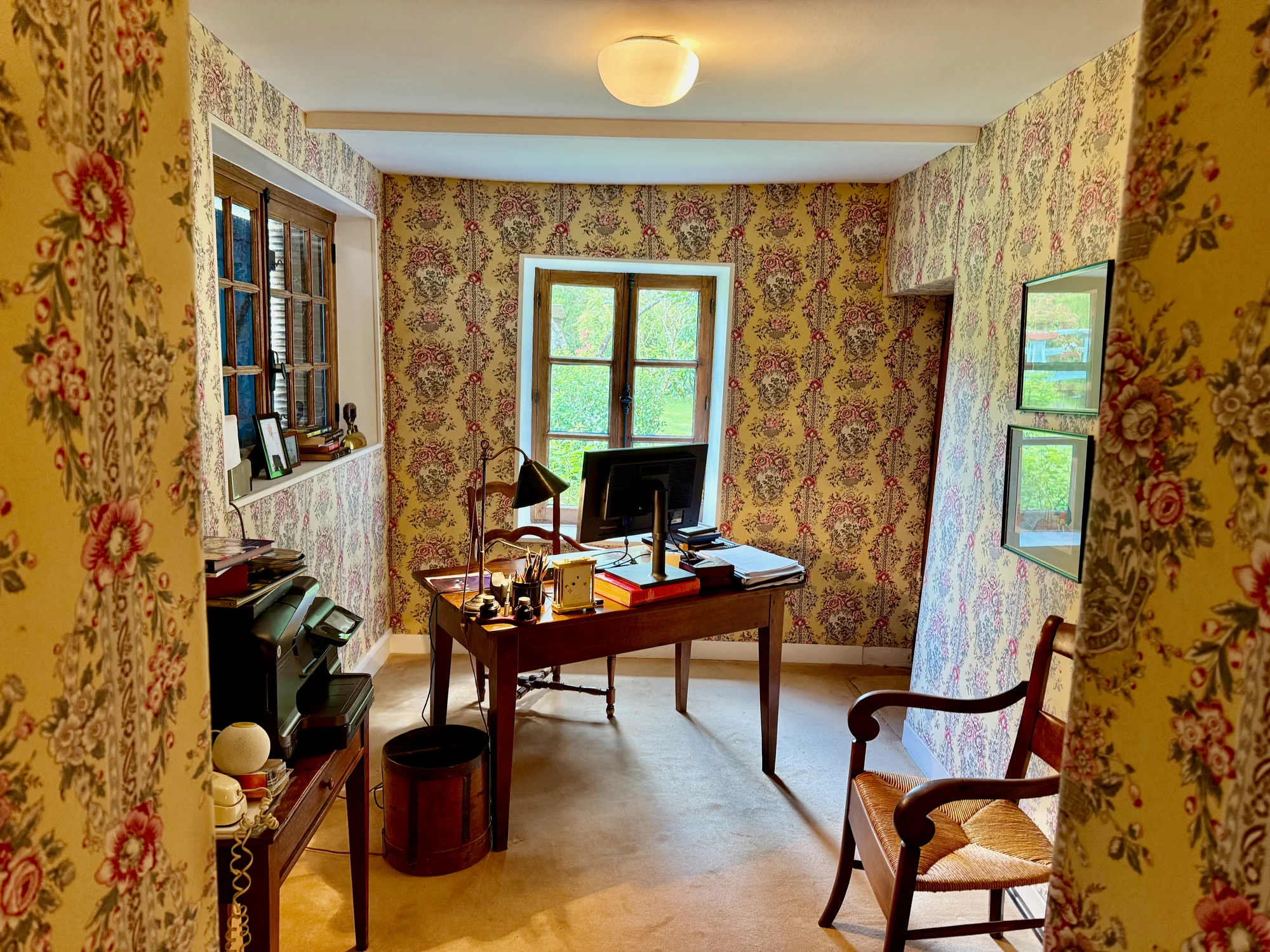 Le Moulin office with desk and reading chair