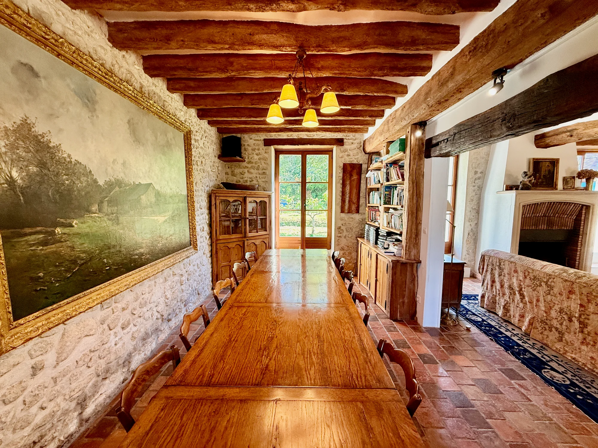 Long wooden board-room dining table for retreat-style gatherings